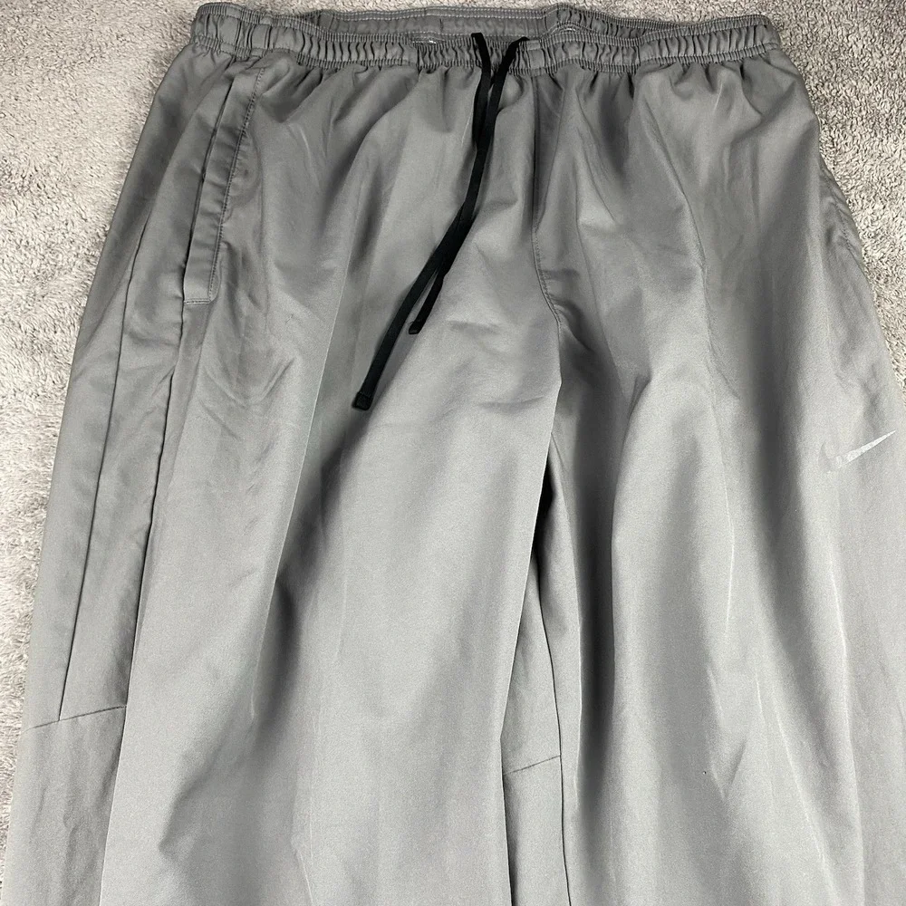 Nike Dri-Fit Track Jogger Pants Mens XXL‎ Gray Lined Elastic Waist Zip Ankle